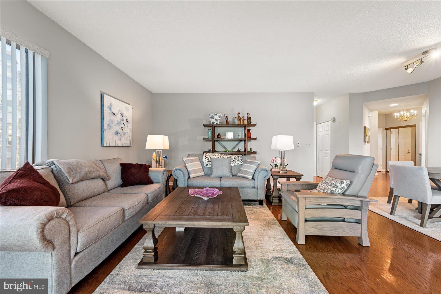 19375 Cypress Ridge Terrace, Unit 207 Leesburg, VA 20176 - Photo 6 of 44 a living room with furniture