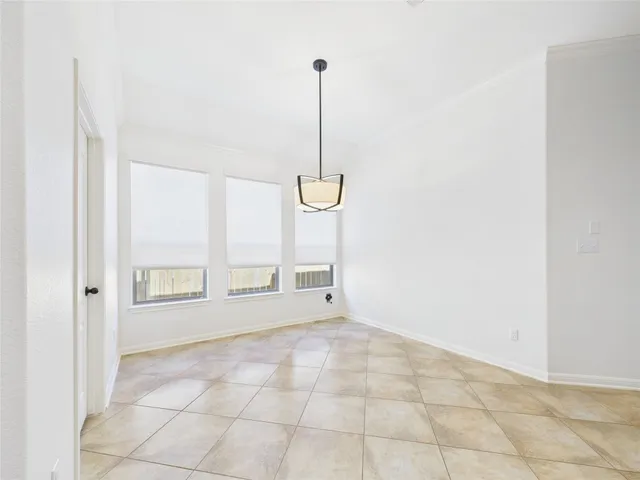 a view of an empty room with window