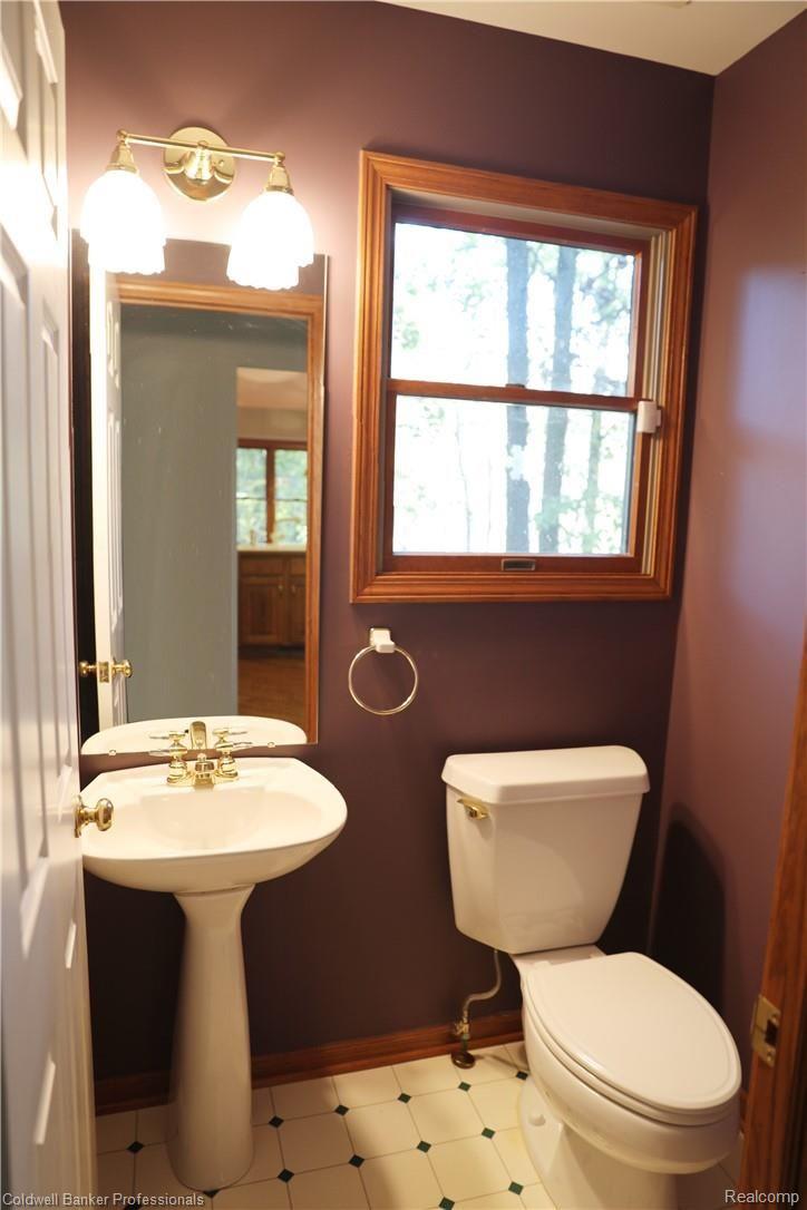 9840 Norman Road Clarkston, MI 48348 - Photo 33 of 45 Half bath with a view.