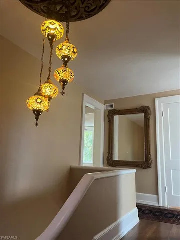 a front view of a house with wooden floor