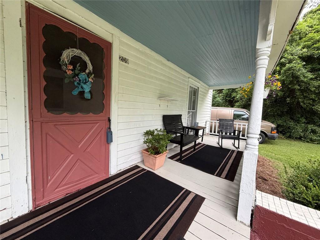 209 Old Perry Road Marshallville, GA 31057 - Photo 24 of 40 a front view of a house with garden