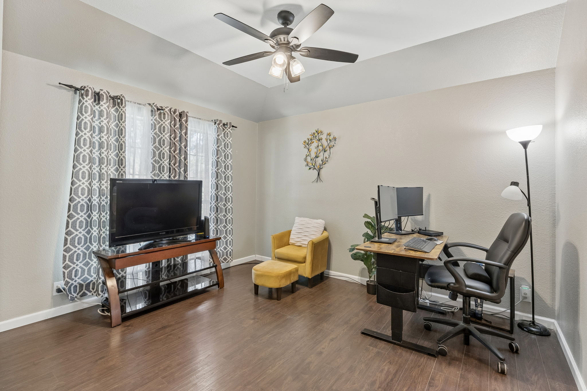 159 Invierno Street Kyle, TX 78640 - Photo 19 of 40 This bonus space gives your household flexibility for a home office, media room, formal dining, and more.