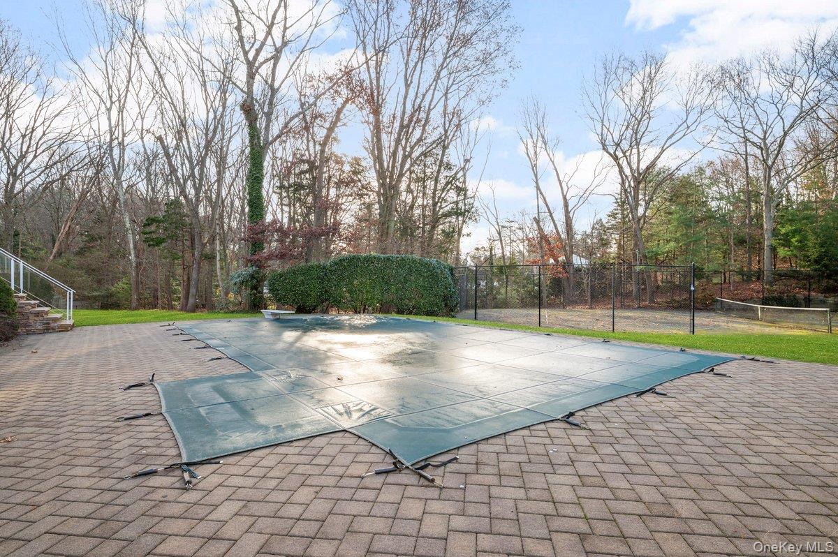 90 Rodeo Drive Syosset, NY 11791 - Photo 5 of 15 a view of a park with trees
