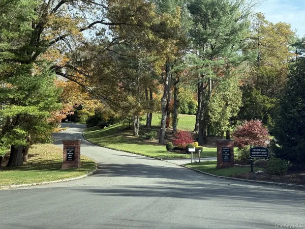 a view of street along with trees