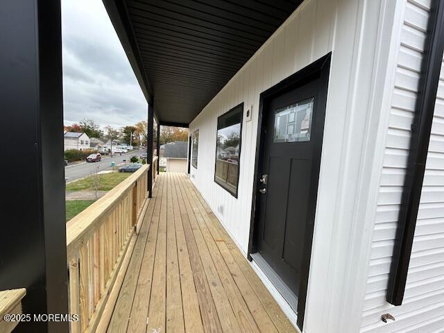 43 Salem Place Cliffwood, NJ 07721 - Photo 2 of 17 a view of balcony with wooden floor