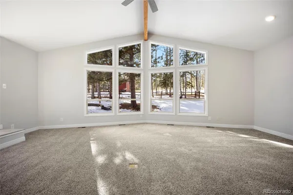 an empty room with windows