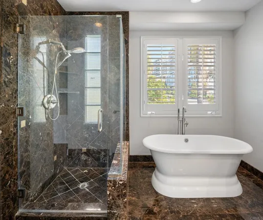 a bedroom with a bed and a lamp