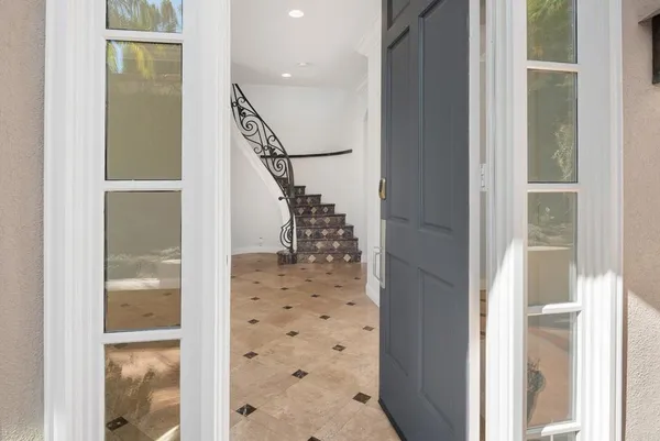 a view of kitchen with wooden floor