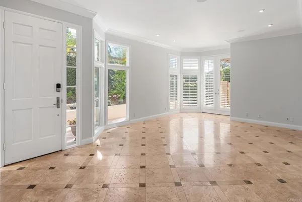 a view of an empty room and window