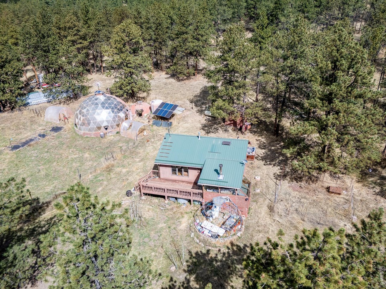 263 Badger Court Drake, CO 80515 - Photo 1 of 41 an aerial view of a house with a yard