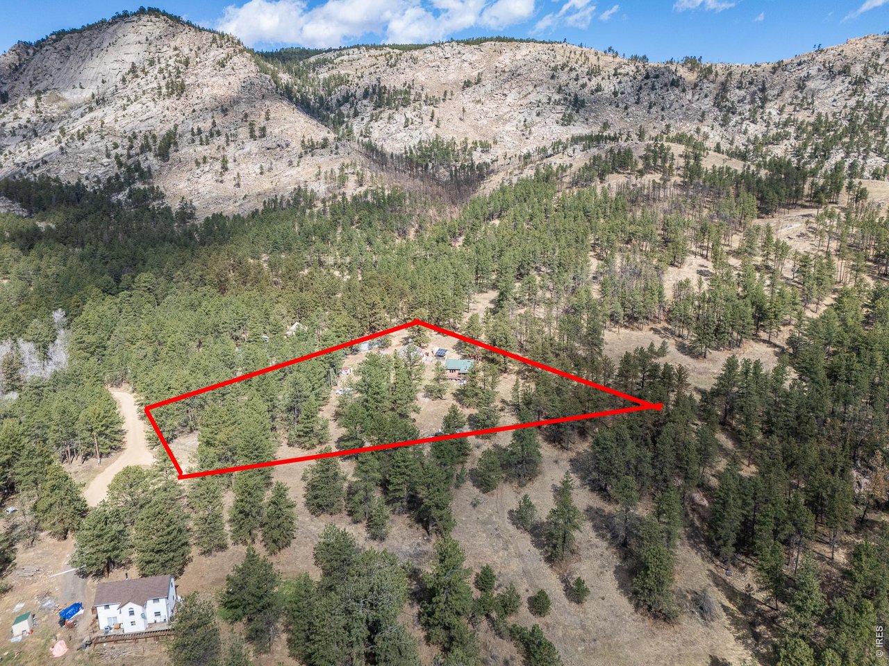 263 Badger Court Drake, CO 80515 - Photo 2 of 41 a view of a small yard