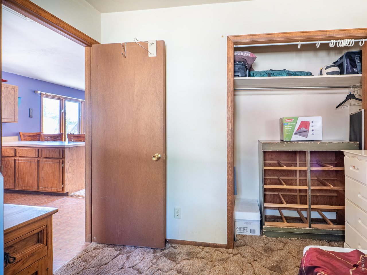 263 Badger Court Drake, CO 80515 - Photo 22 of 41 a view of kitchen with wooden floor and cabinets