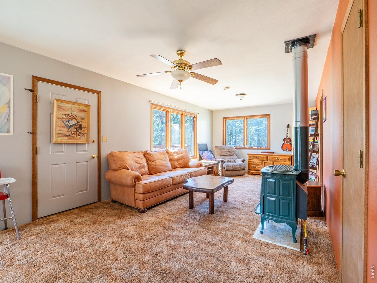 263 Badger Court Drake, CO 80515 - Photo 10 of 41 a living room with furniture and a window