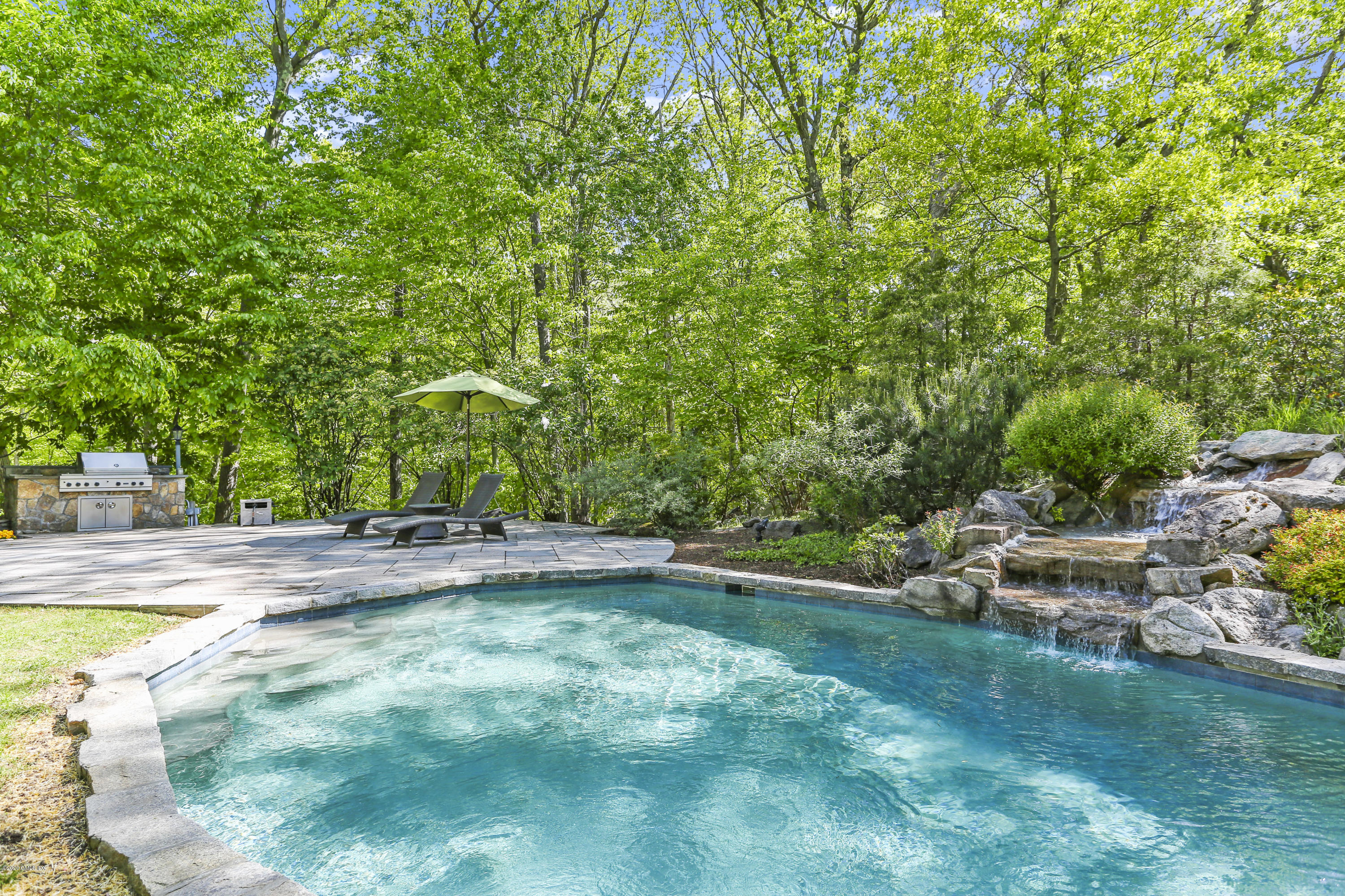 31 Horseshoe Road Cos Cob, CT 06807 - Photo 22 of 34 pool looking to grill