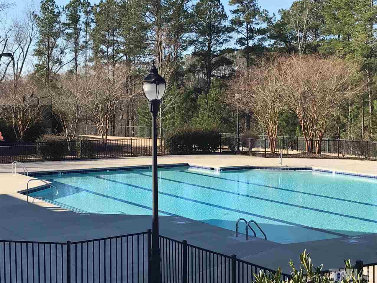 8511 Mt Valley Lane Raleigh, NC 27613 - Photo 21 of 25 a view of swimming pool with trees