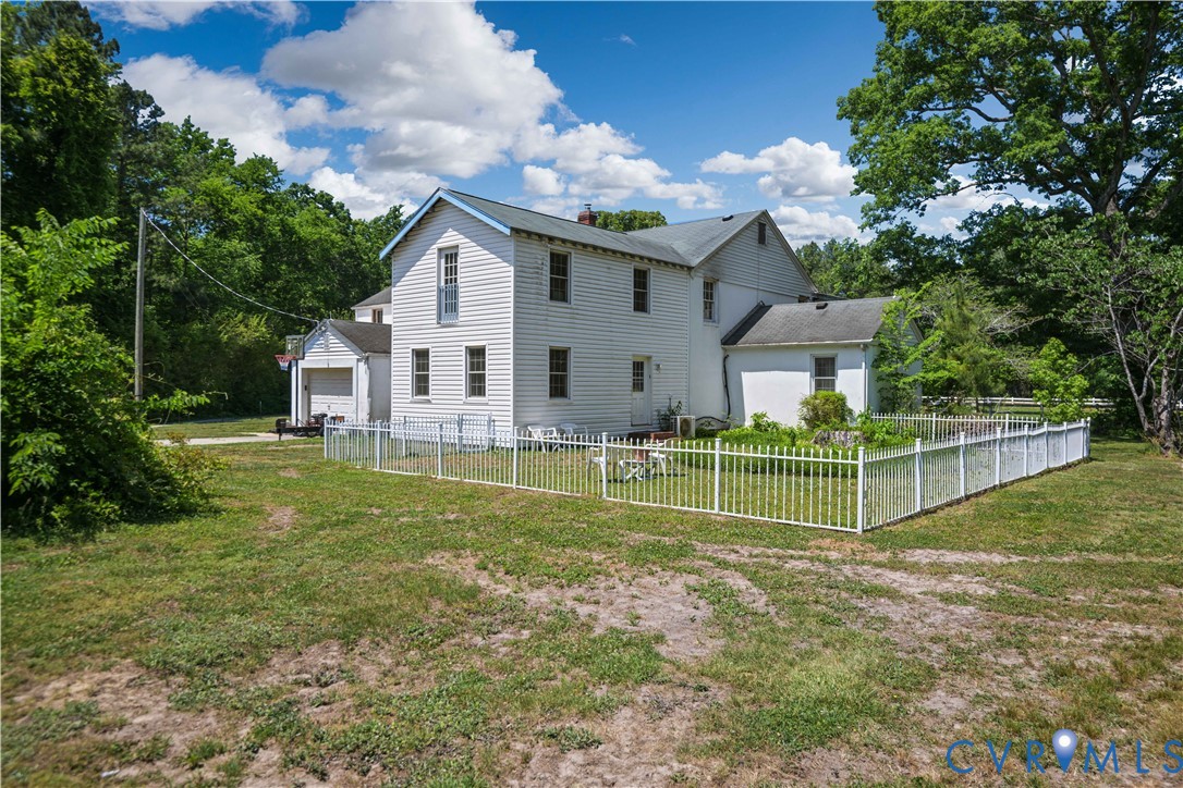 6243 Studley Road Mechanicsville, VA 23116 - Photo 59 of 65 a view of house with a big yard and potted plants