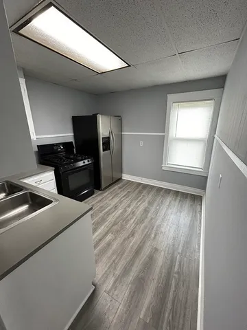 a view of a livingroom with a flat screen tv