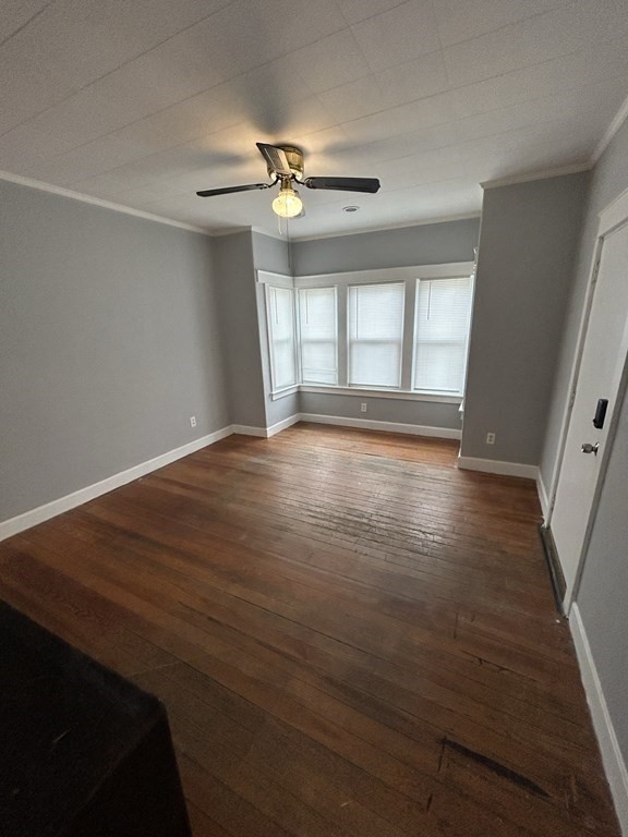 623-631 Birch Street, Unit 2 Fall River, MA 02724 - Photo 10 of 17 a view of empty room with wooden floor and fan