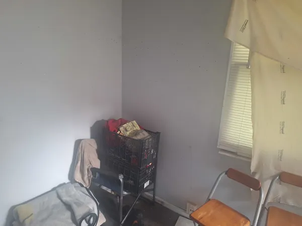 a workspace with furniture and a window