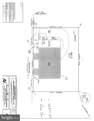 a picture of a bathroom with a shower