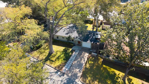 a view of swimming pool from a tree