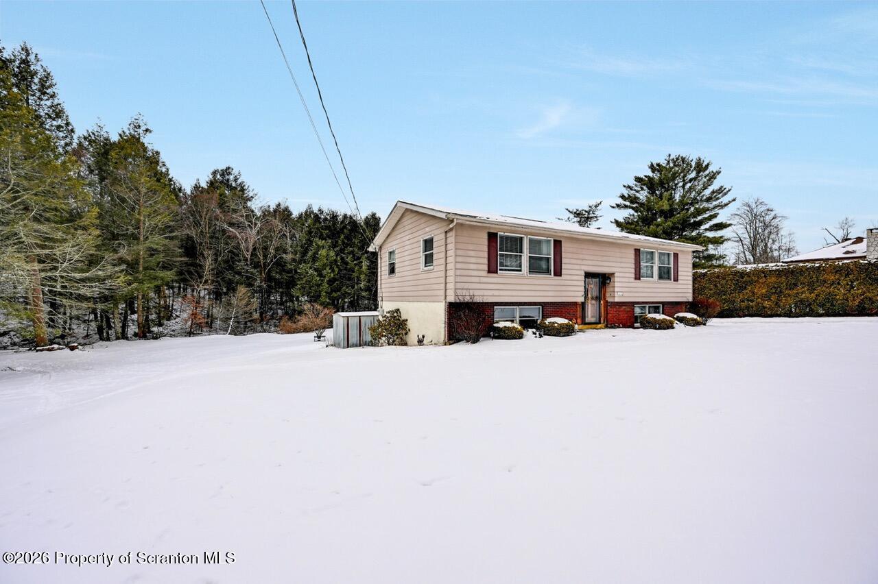 1317 Heart Lake Road Scott Township, PA 18433 - Photo 50 of 60 a car parked in front of house