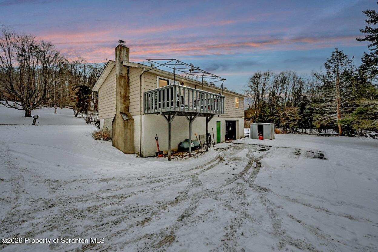 1317 Heart Lake Road Scott Township, PA 18433 - Photo 5 of 60 a view of a street with a building in the background