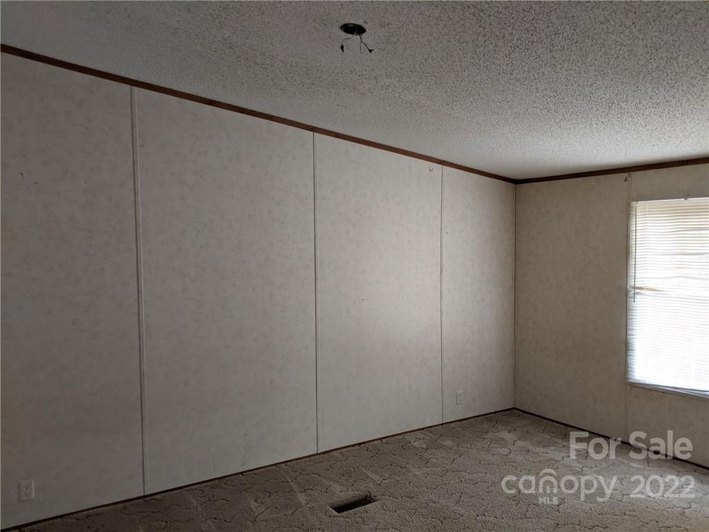 1449 State Rd S-28-313 Cassatt, SC 29032 - Photo 11 of 13 a view of an empty room