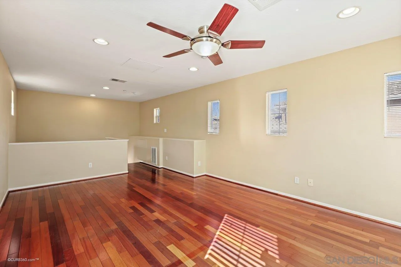 1685 Avery Road San Marcos, CA 92078 - Photo 20 of 26 a view of an empty room with wooden floor
