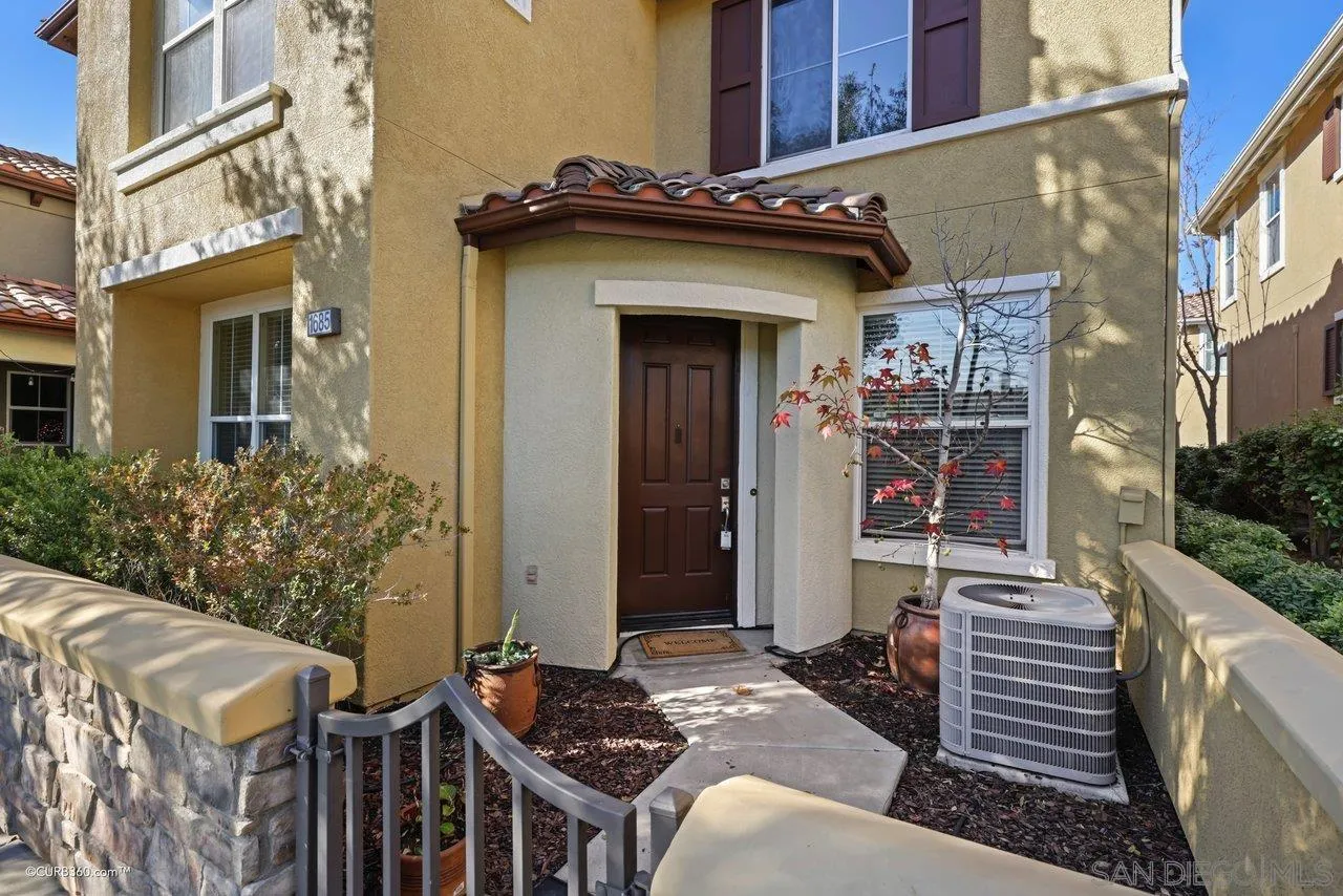1685 Avery Road San Marcos, CA 92078 - Photo 3 of 26 a front view of a house with entryway