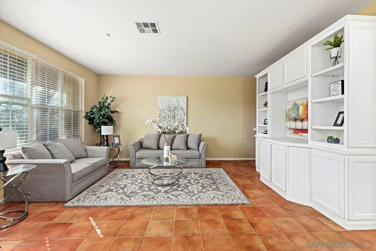 1685 Avery Road San Marcos, CA 92078 - Photo 8 of 26 a living room with furniture and a rug