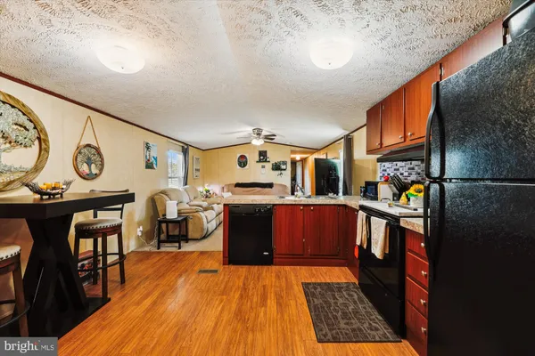 a view of a living room and dining room