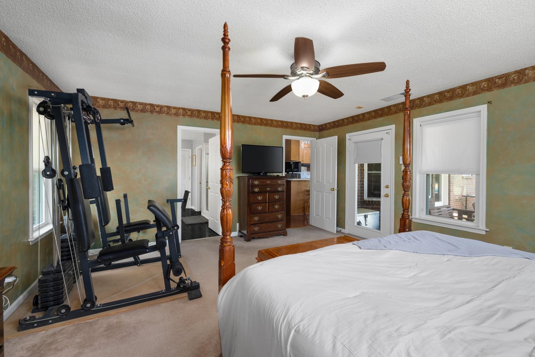 8539 Campground Road Drummonds, TN 38023 - Photo 19 of 38 a bed room with a bed and a mirror