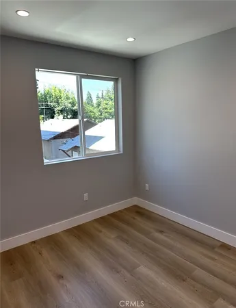 a view of a room that has a window in it