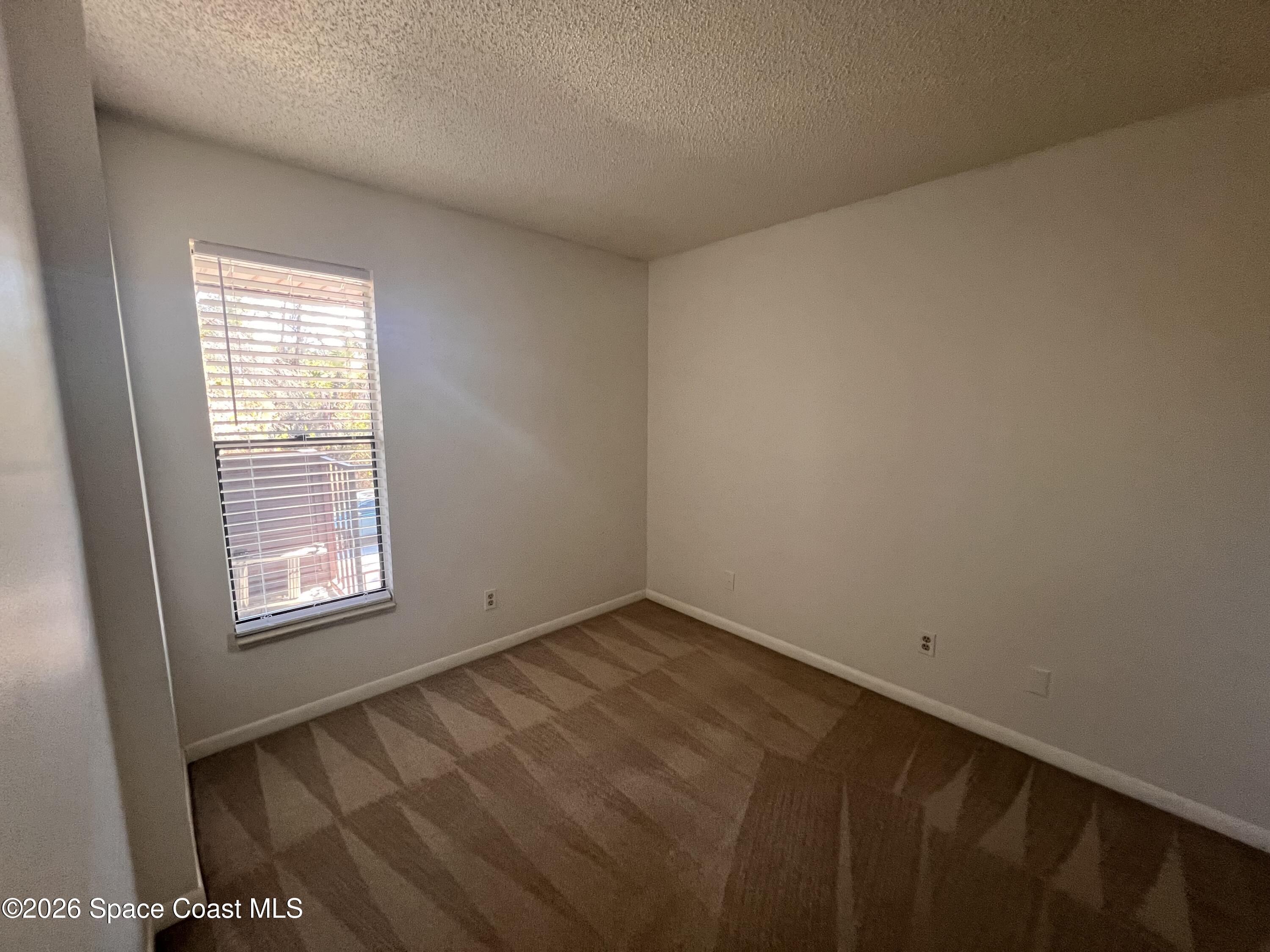 1011 Clearmont Street Northeast, Unit 2022 Palm Bay, FL 32905 - Photo 7 of 19 IMG_4468