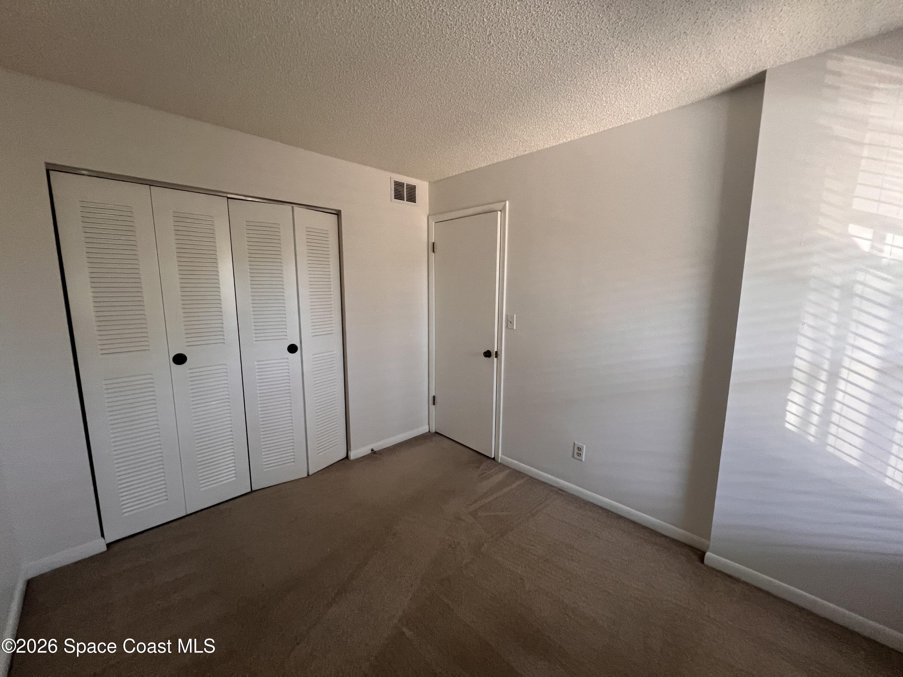 1011 Clearmont Street Northeast, Unit 2022 Palm Bay, FL 32905 - Photo 8 of 19 IMG_4469