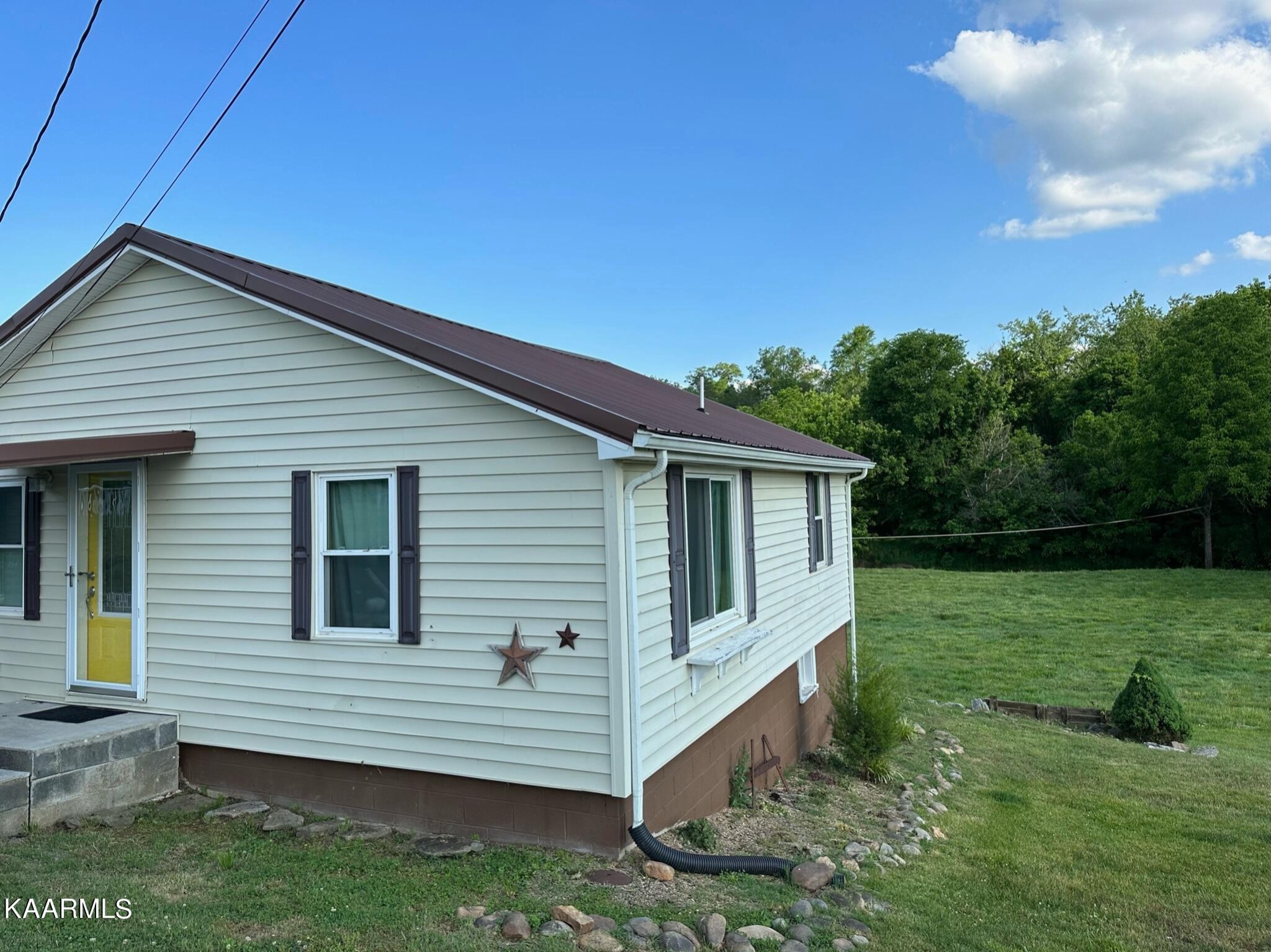 609 Bryan Road Rutledge, TN 37861 - Photo 2 of 47 a view of a house with backyard