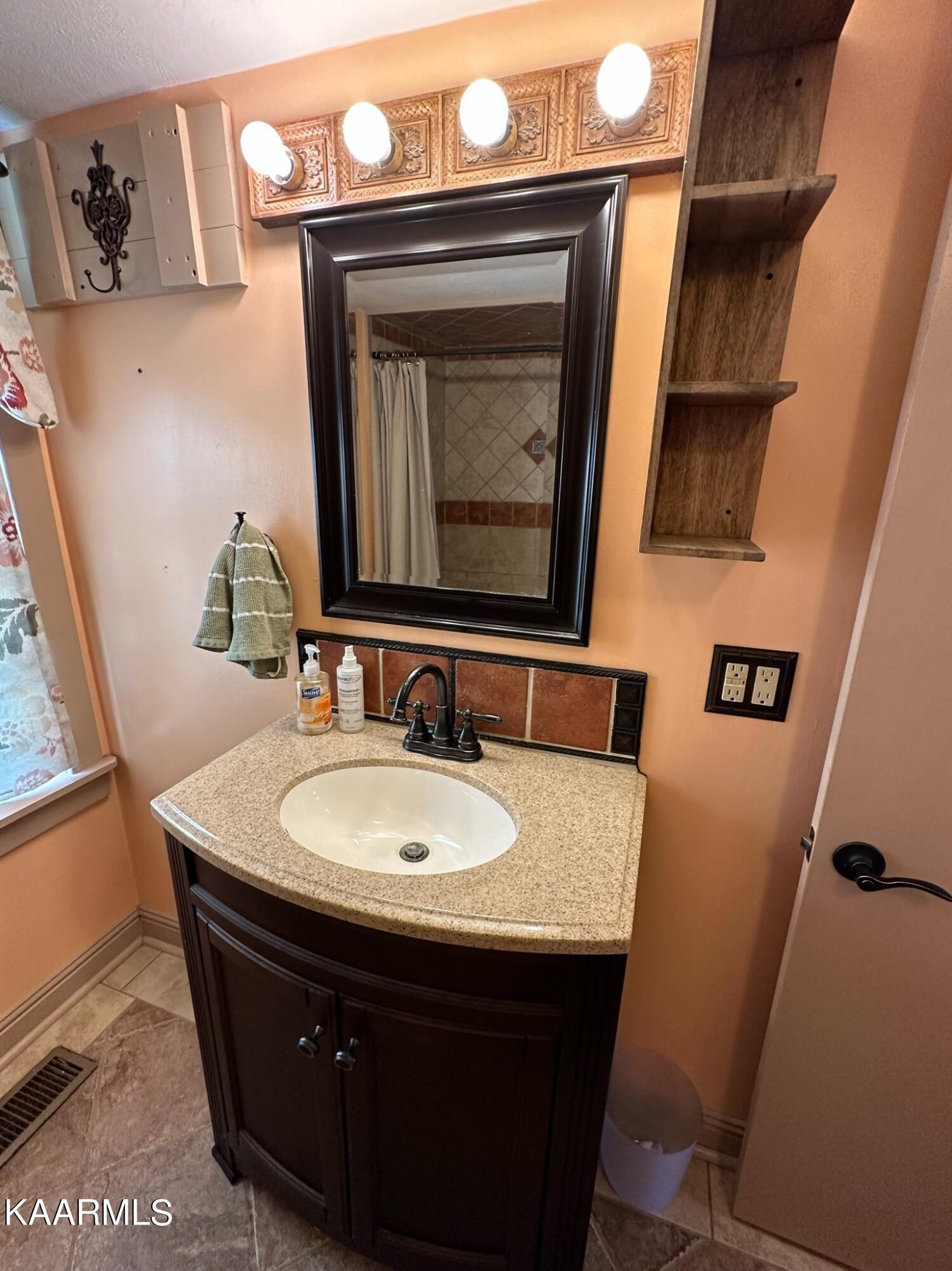 609 Bryan Road Rutledge, TN 37861 - Photo 24 of 47 a bathroom with a sink and a mirror
