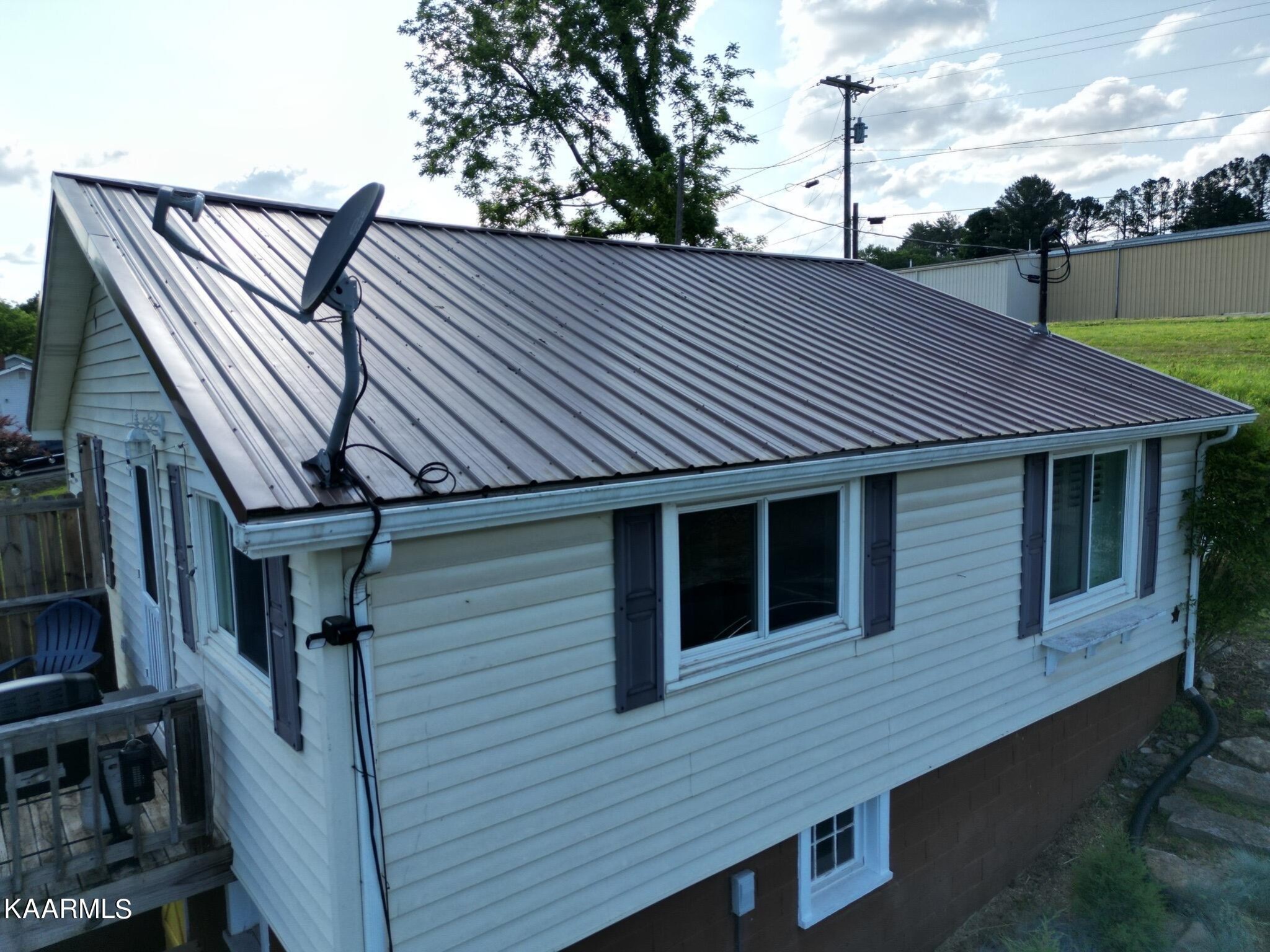 609 Bryan Road Rutledge, TN 37861 - Photo 6 of 47 a view of a house with backyard and deck