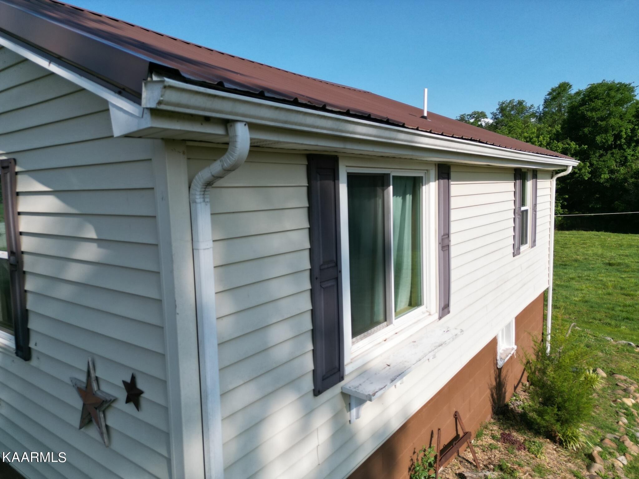 609 Bryan Road Rutledge, TN 37861 - Photo 7 of 47 a view of wooden house with a large window