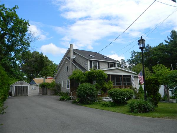 4 Couture Road Southampton, MA 01073 - Photo 1 of 28 a front view of a house with garden