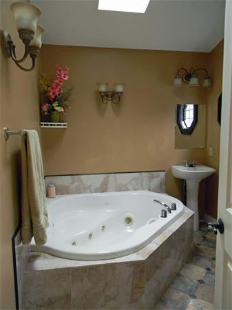 4 Couture Road Southampton, MA 01073 - Photo 28 of 28 a bathroom with a tub and a shower