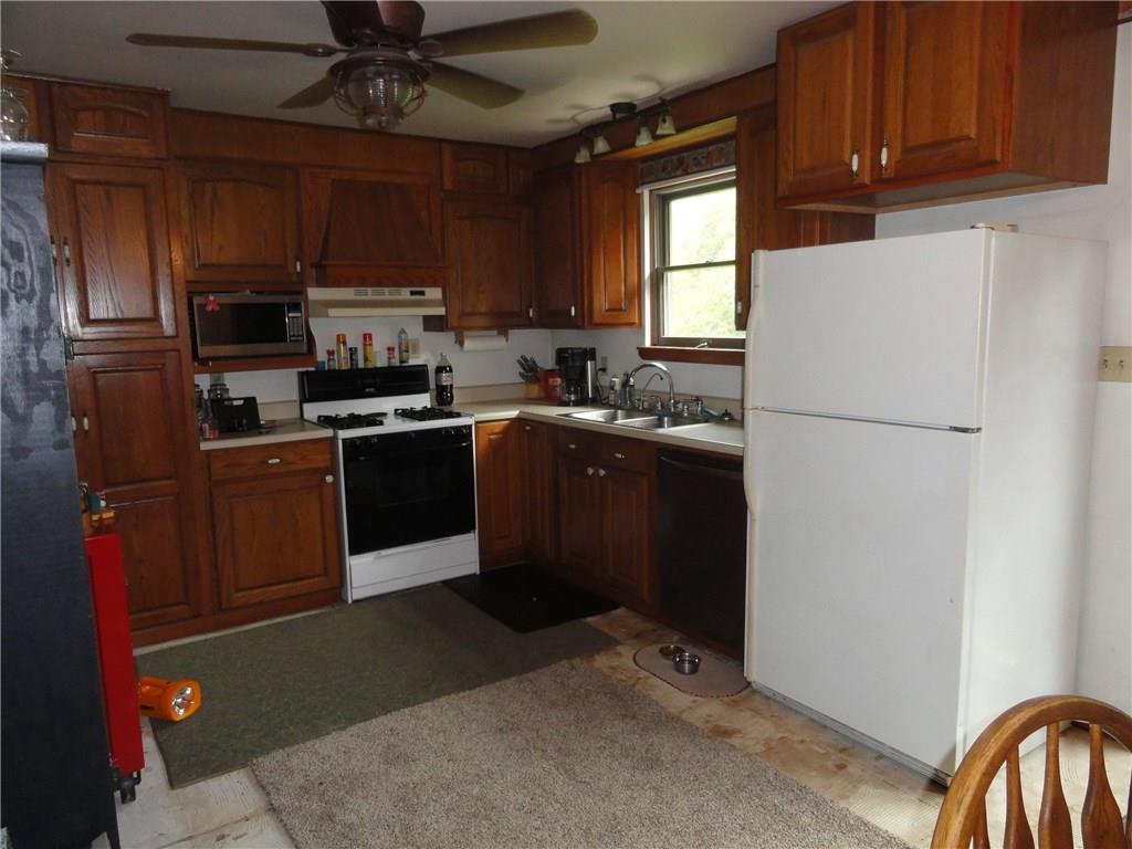 61 East Simmons Road Washington, PA 15301 - Photo 8 of 23 A kitchen to love with fold out shelving in cabinetry to maximize pantry space