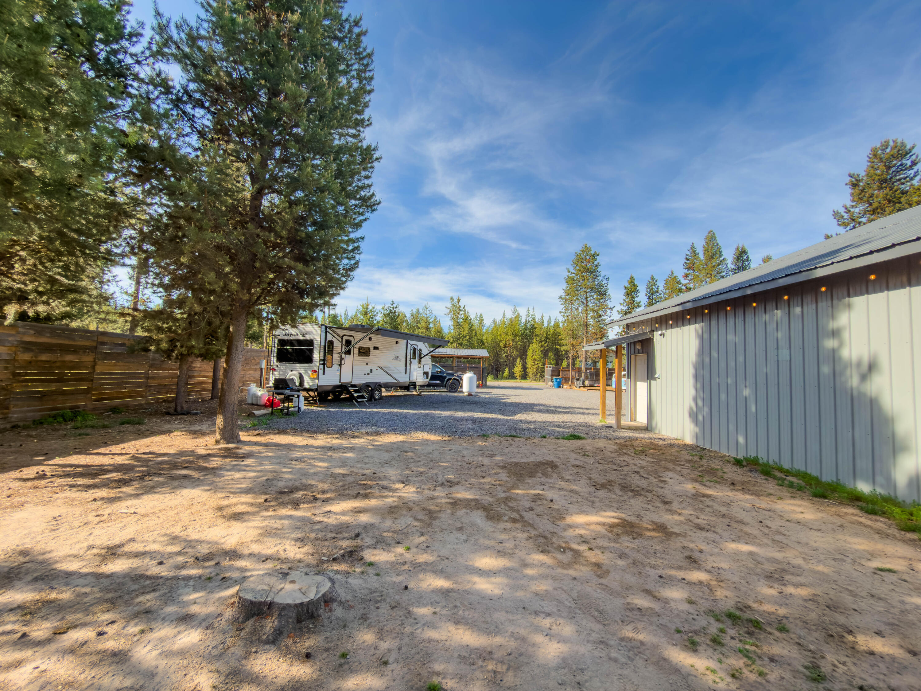 17140 Fontana Road Bend, OR 97707 - Photo 17 of 22 a view of a street with a building in the background
