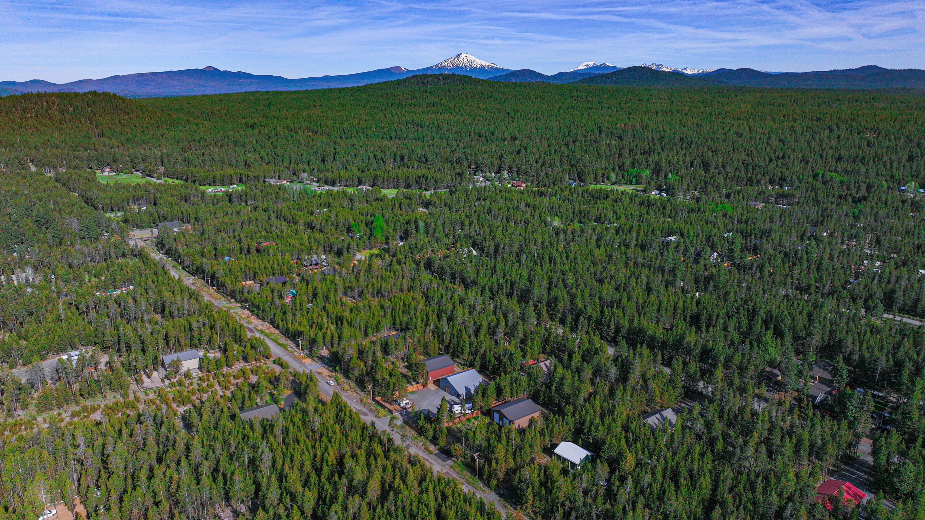 17140 Fontana Road Bend, OR 97707 - Photo 22 of 22 a view of a lush green hillside and a houses