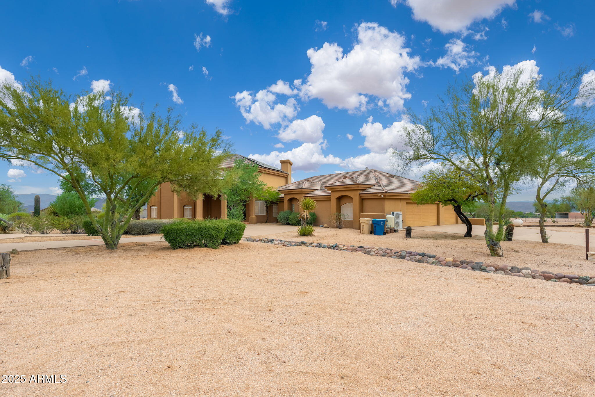 17047 East Dixileta Drive Rio Verde, AZ 85263 - Photo 113 of 115 a view of a house with a snow in a yard