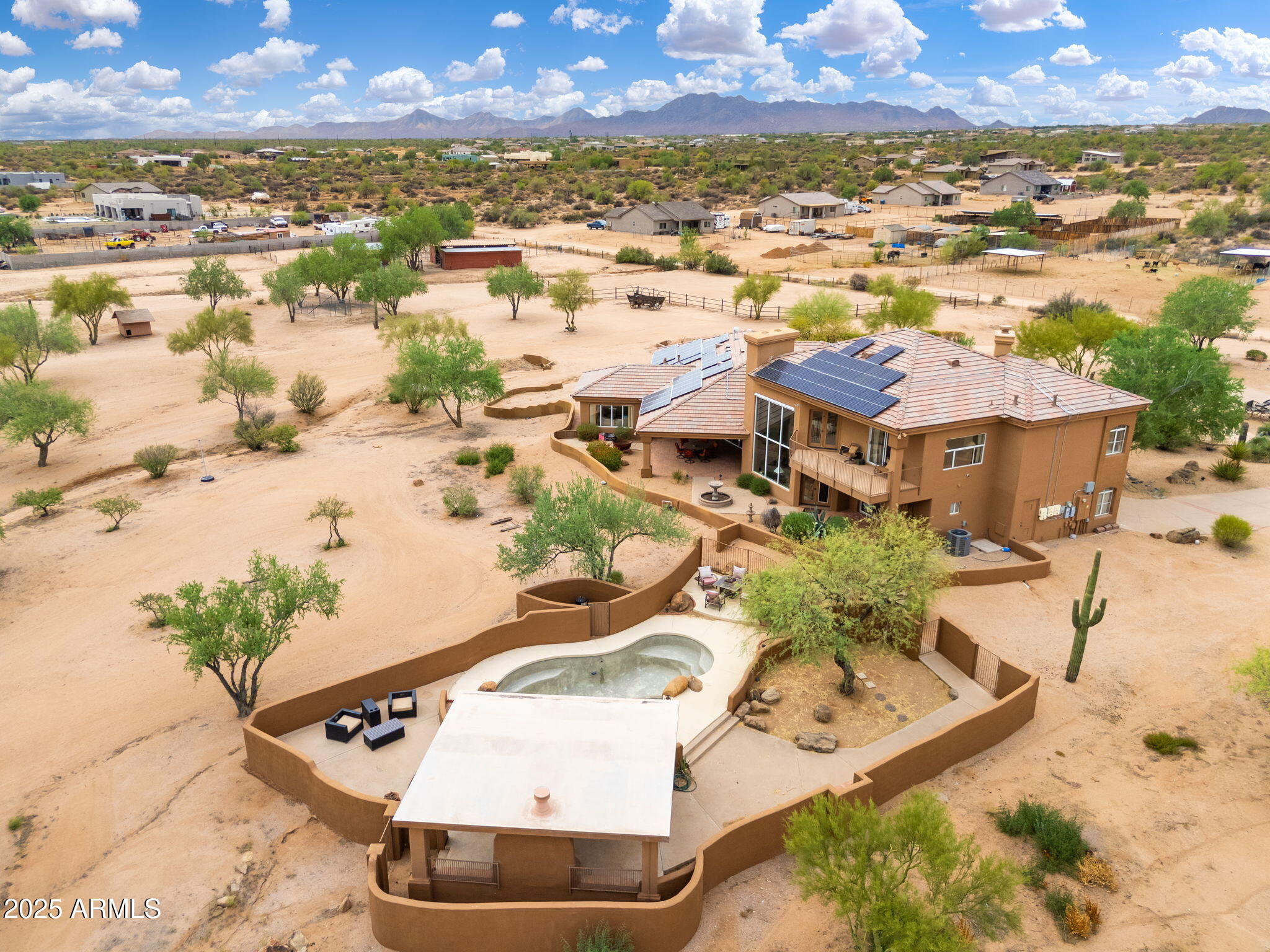 17047 East Dixileta Drive Rio Verde, AZ 85263 - Photo 23 of 115 an aerial view of residential houses with outdoor space