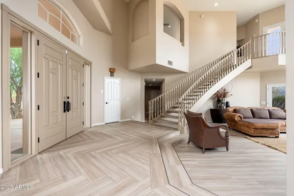 a large spacious bathroom with a large tub shower and sink