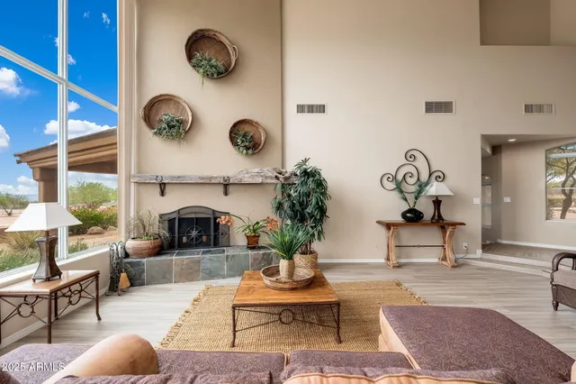 a bathroom with a bathtub and a window