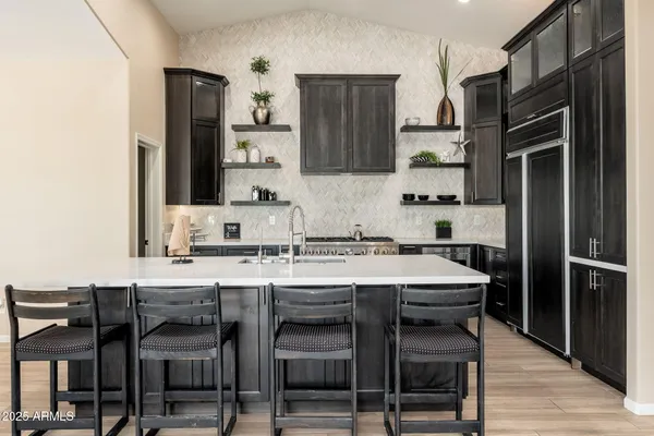 a view of a livingroom with furniture and a potted plant